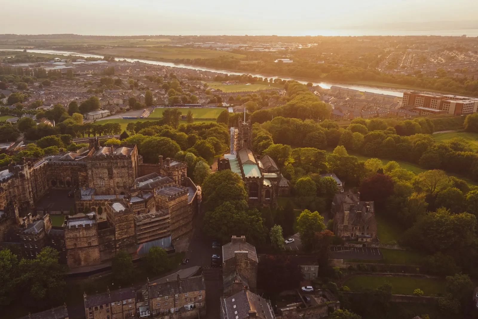 Lancaster from the air with the castle on the hill above the river
